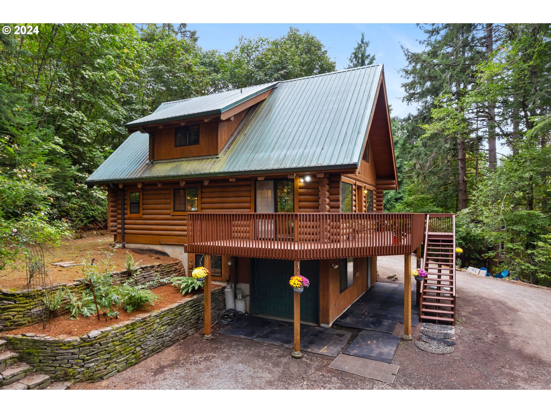 24271 South Newkirchner Road Oregon City, OR 97045 - Photo 4 of 41 a view of house with a patio outdoor seating yard