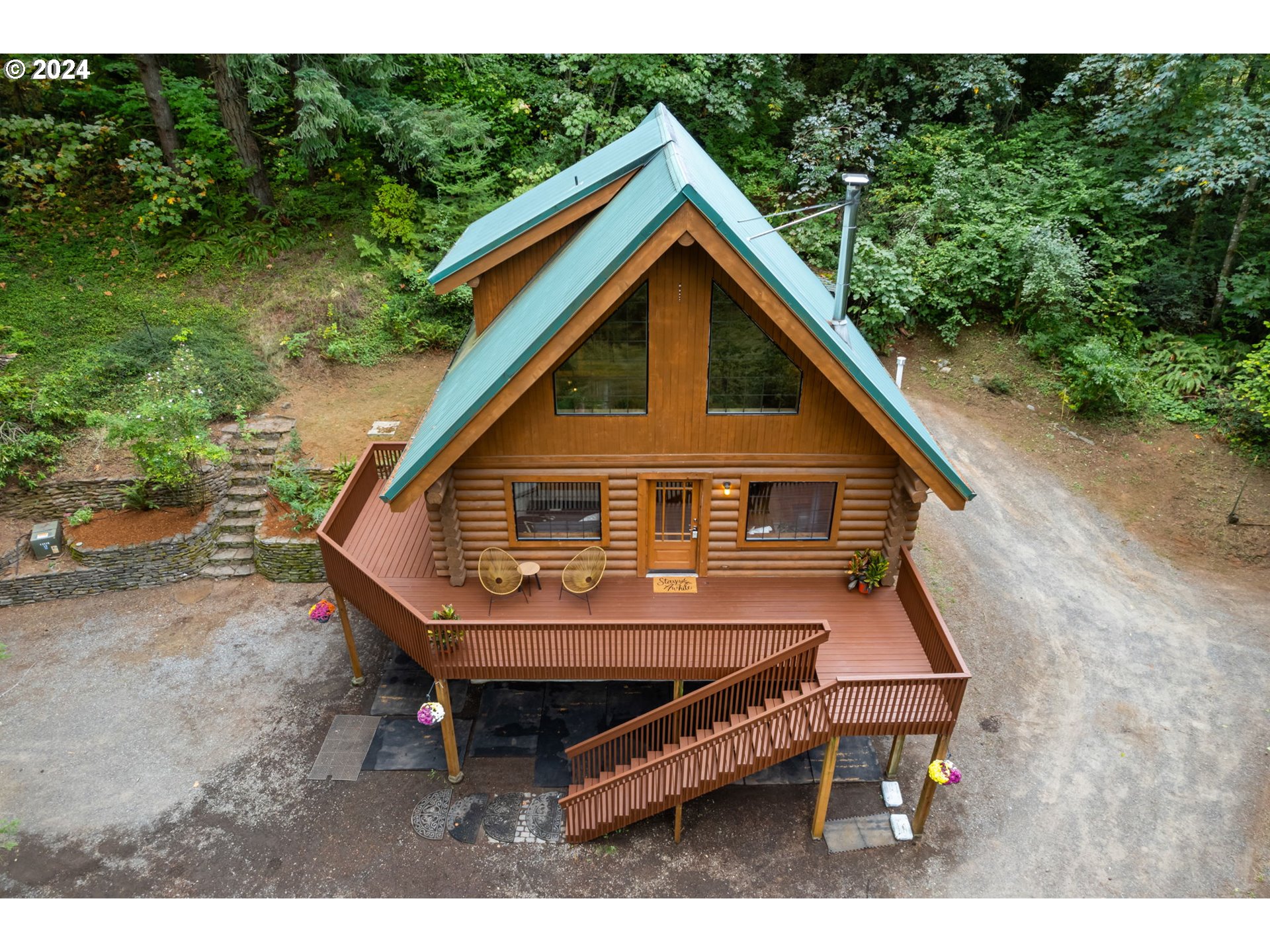 24271 South Newkirchner Road Oregon City, OR 97045 - Photo 5 of 41 a view of backyard of house with wooden stairs