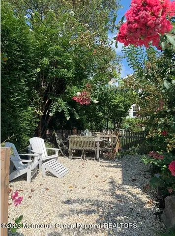a view of outdoor sitting area with furniture