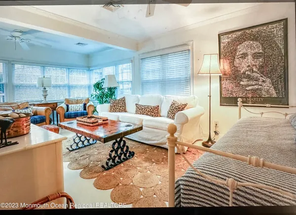 a living room with furniture and a table