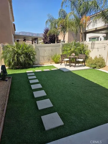 a view of a backyard with a garden