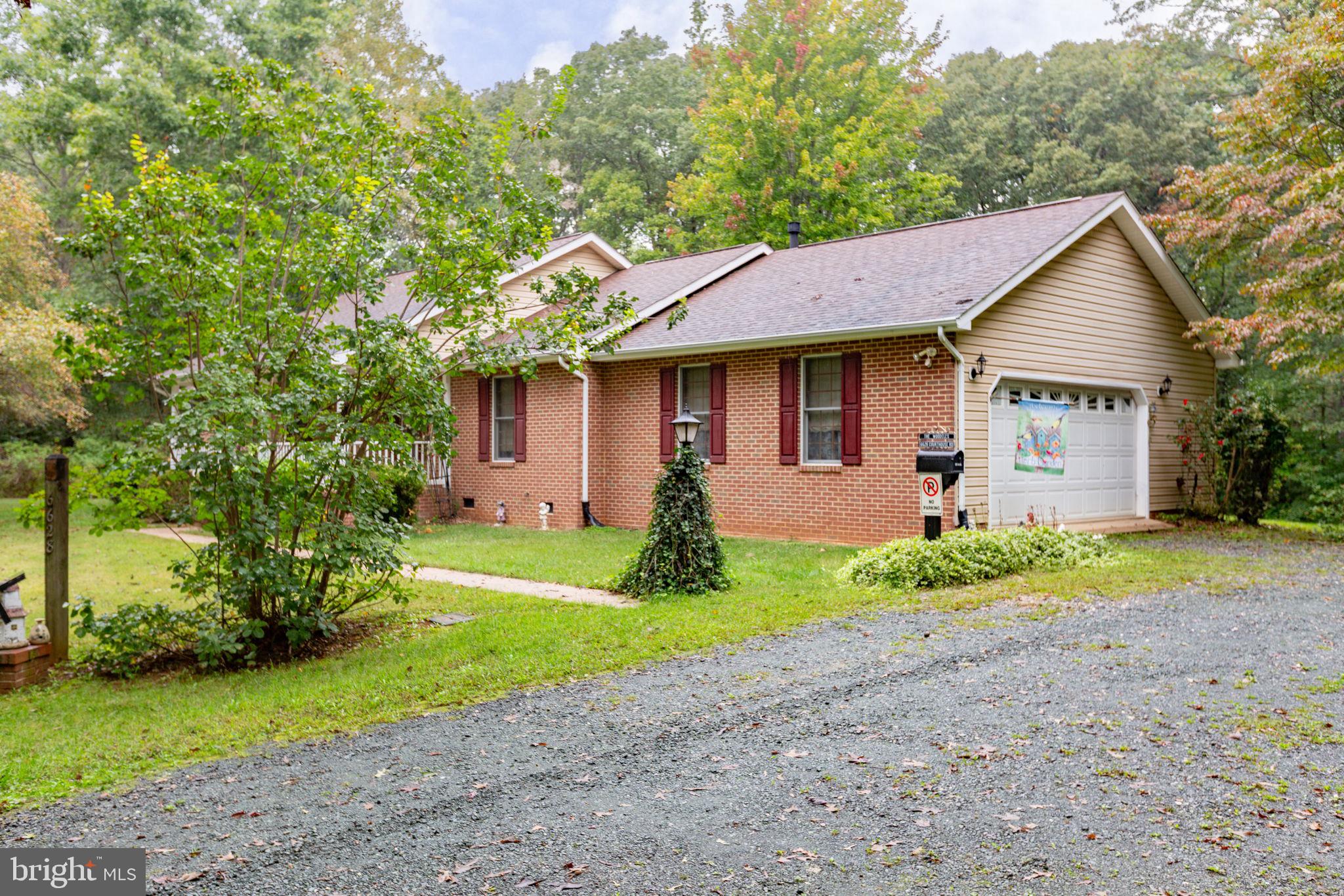 6628 Courthouse Road Spotsylvania, VA 22551 - Photo 35 of 45 a front view of house with yard and green space