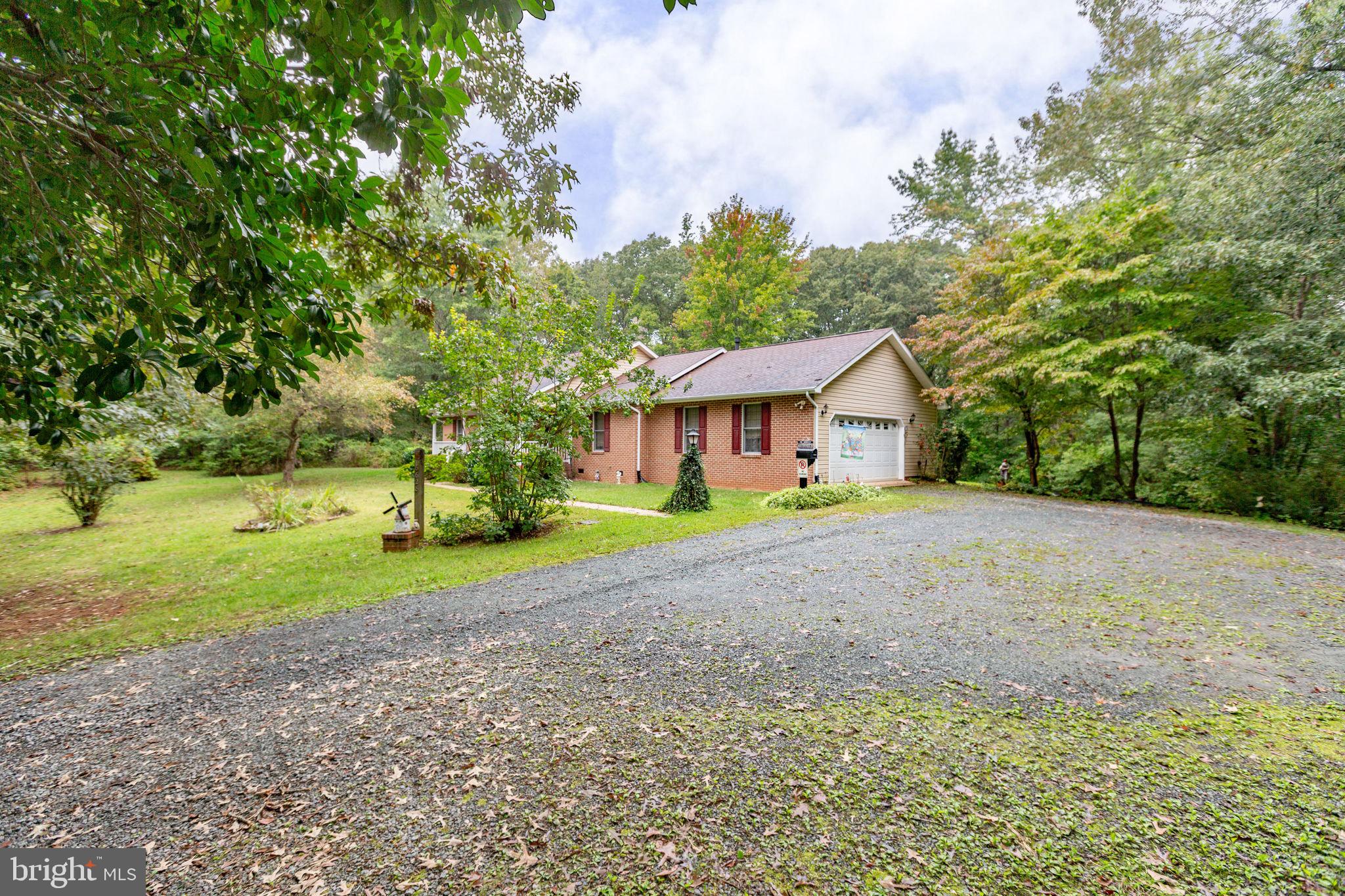 6628 Courthouse Road Spotsylvania, VA 22551 - Photo 36 of 45 a front view of house with yard and green space