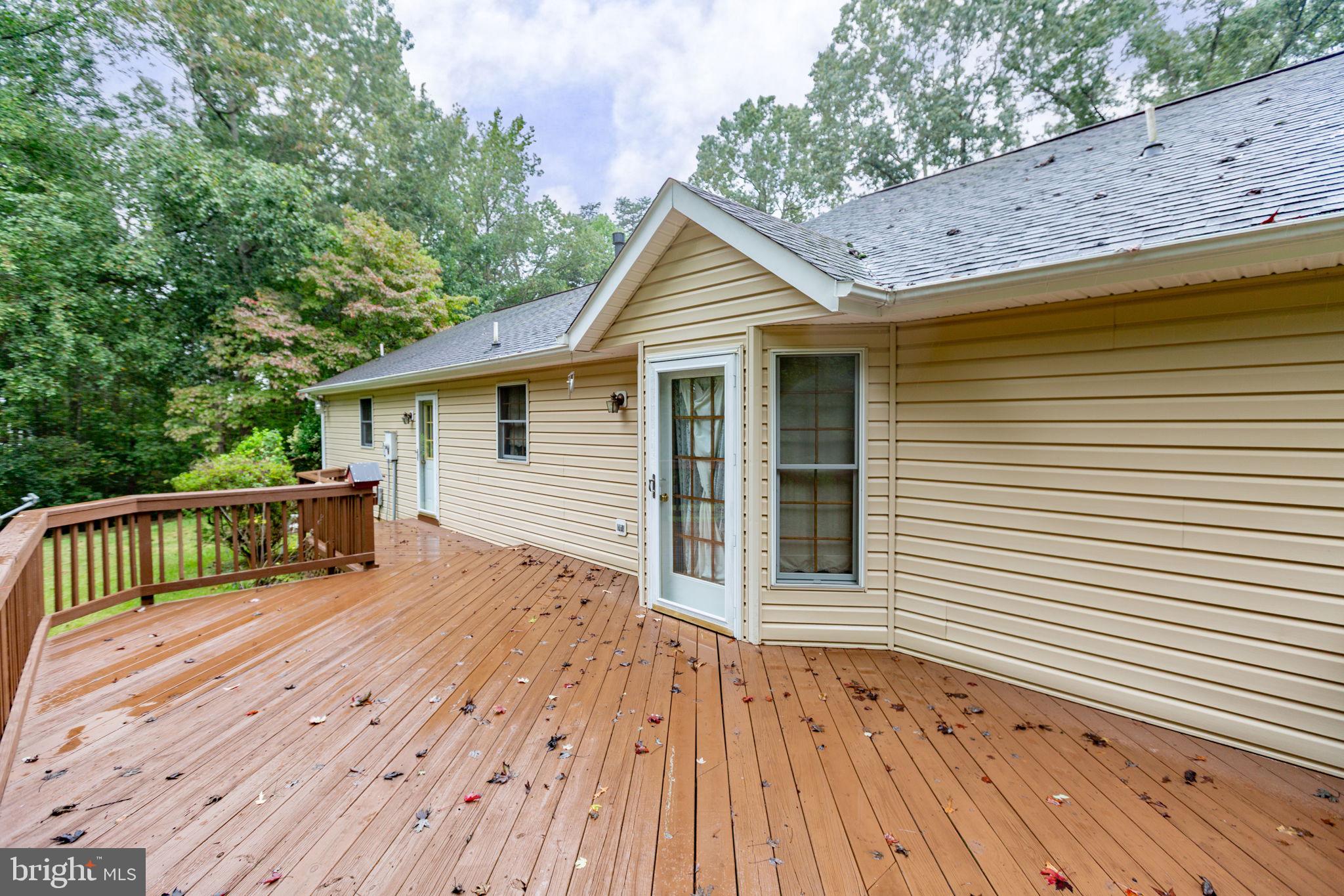 6628 Courthouse Road Spotsylvania, VA 22551 - Photo 43 of 45 a view of backyard with a deck and wooden floor