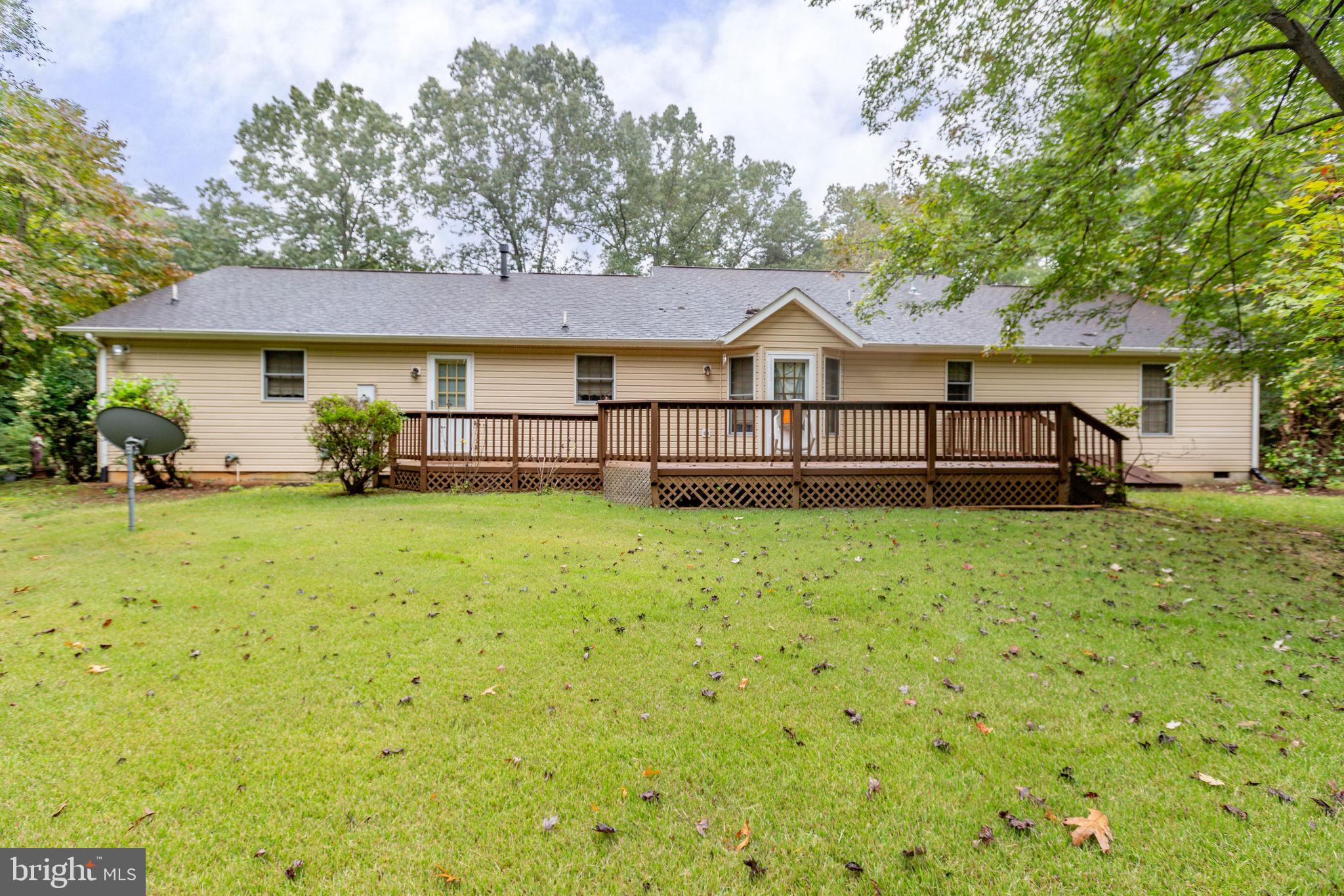 6628 Courthouse Road Spotsylvania, VA 22551 - Photo 5 of 45 a view of a house with a yard