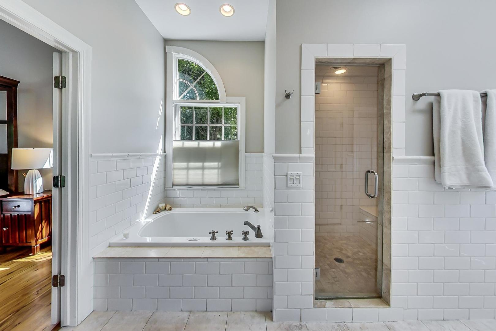 1387 Gettysburg Road Long Grove, IL 60047 - Photo 22 of 46 a bathroom with a bathtub and shower