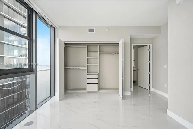 a bathroom with a shower and a bathtub