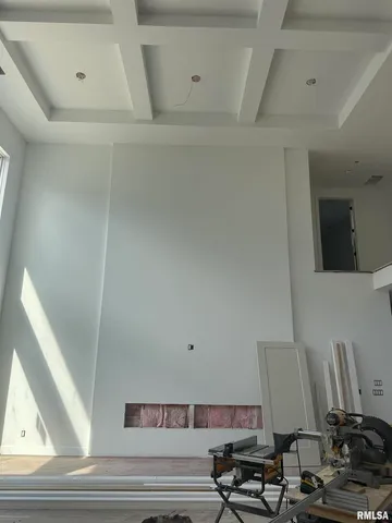 a view of living room with furniture and a window