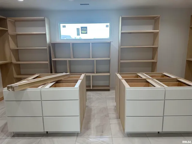 a utility room with washer and dryer