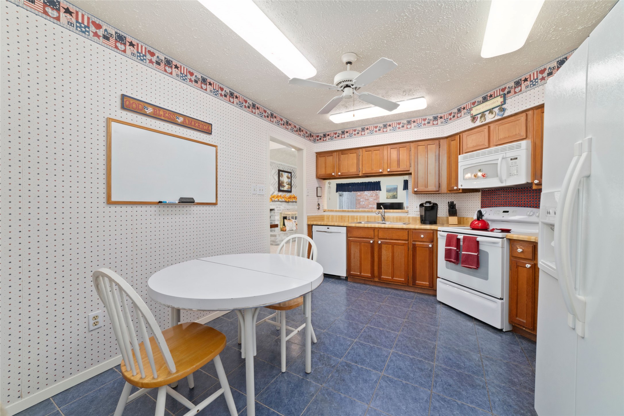 4711 Lost Lake Lane Spring, TX 77388 - Photo 11 of 26 a kitchen with stainless steel appliances kitchen island granite countertop a sink and cabinets