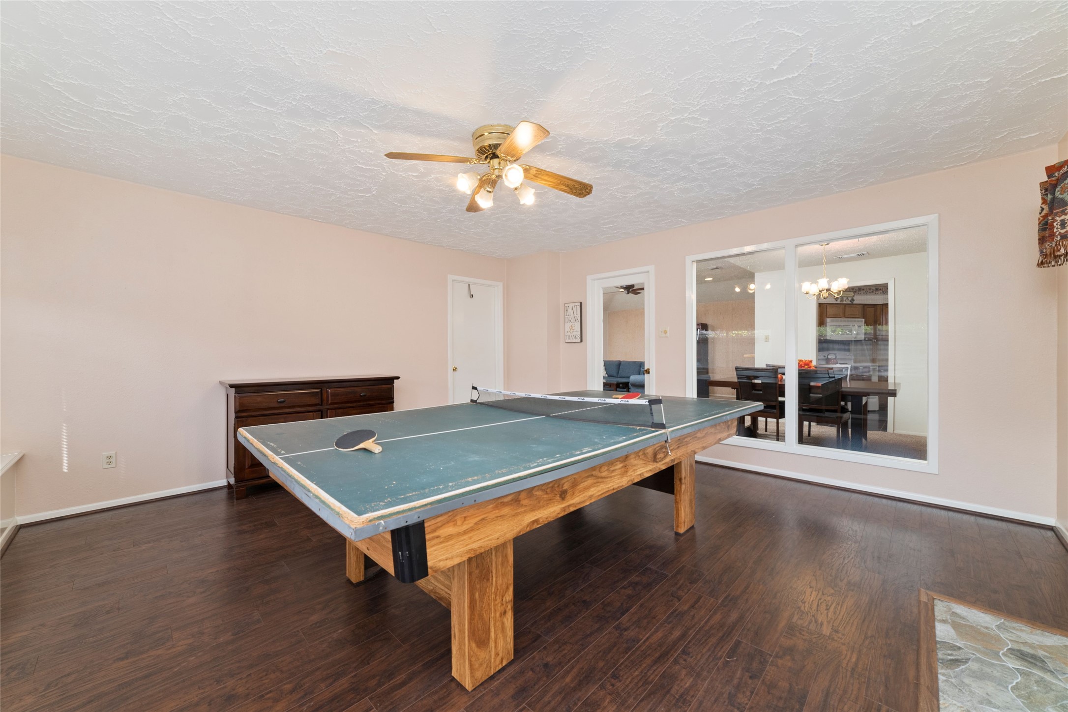 4711 Lost Lake Lane Spring, TX 77388 - Photo 22 of 26 a room with wooden floor pool table and windows