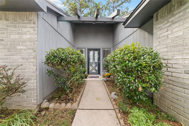 a view of house with yard