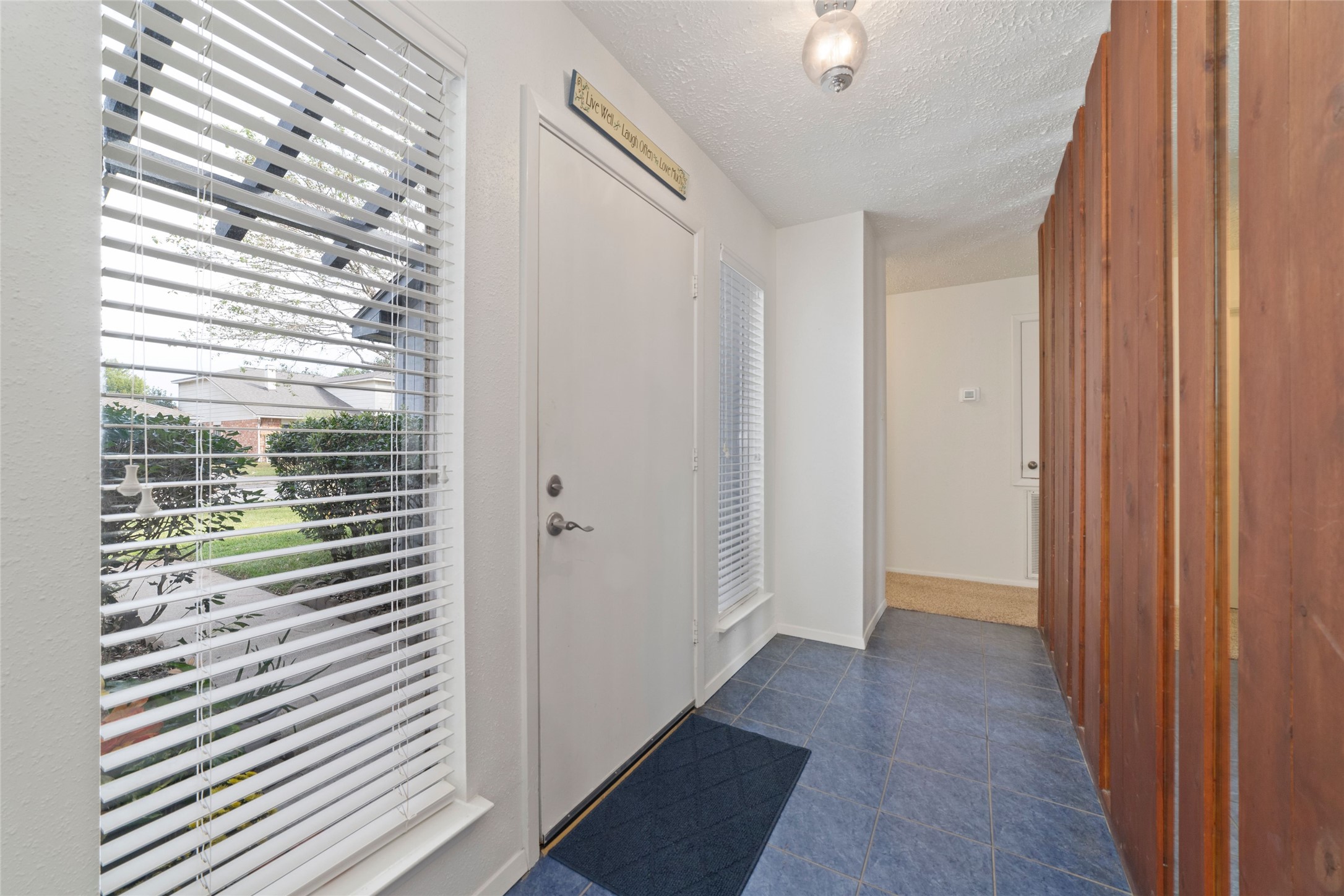4711 Lost Lake Lane Spring, TX 77388 - Photo 5 of 26 a view of a room with a window and a ceiling fan