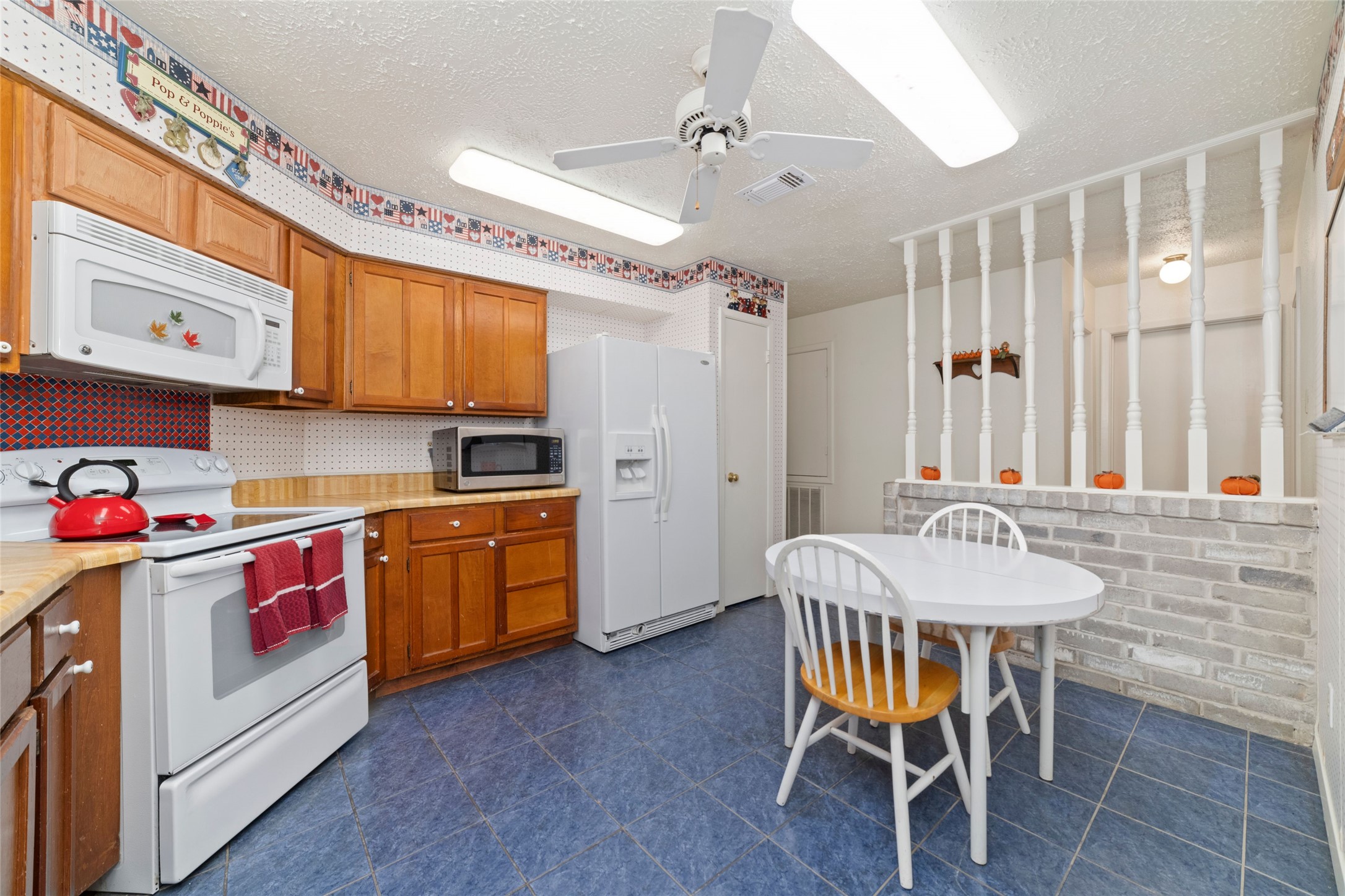 4711 Lost Lake Lane Spring, TX 77388 - Photo 10 of 26 a kitchen that has a table and chairs in it