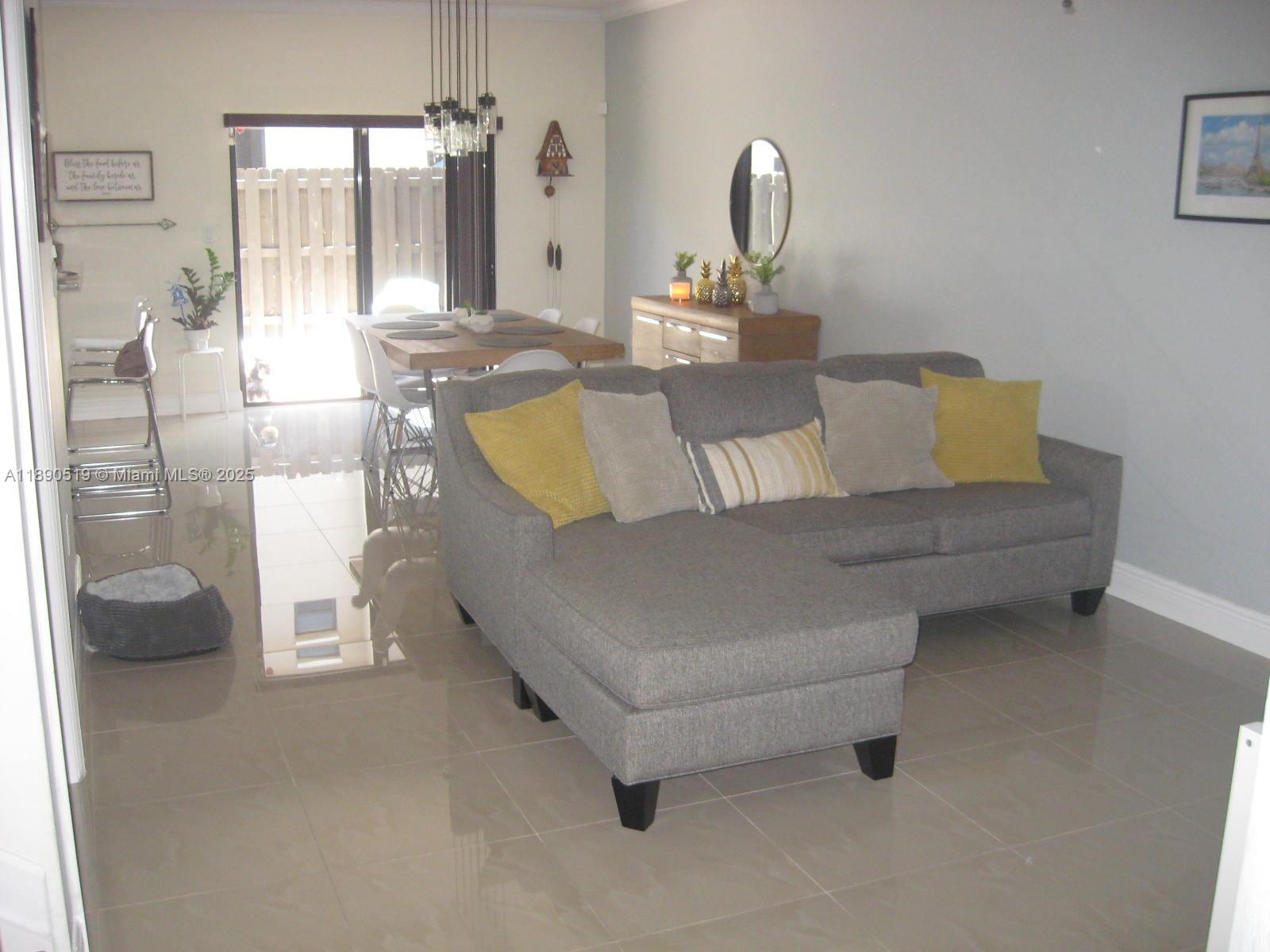 15070 Southwest 117th Way Miami, FL 33196 - Photo 5 of 14 a living room with furniture