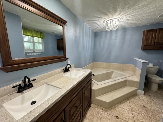 a bathroom with a sink and a bathtub
