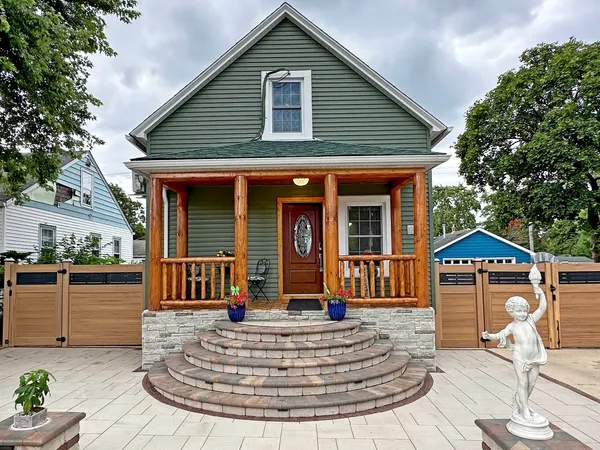 a front view of a house with entertaining space