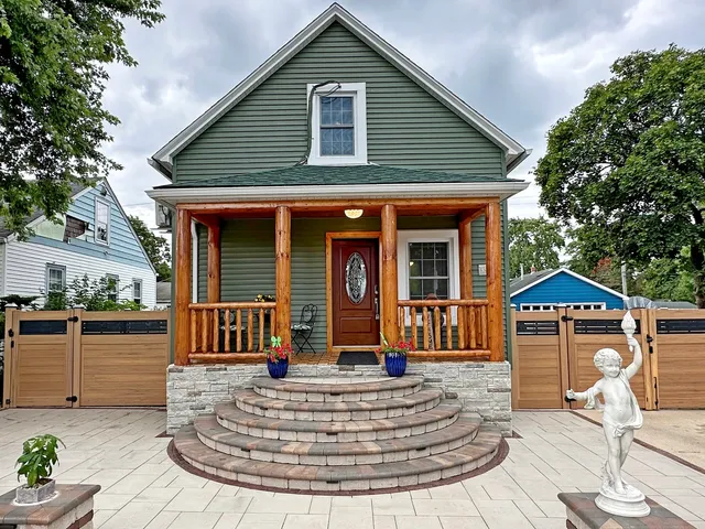 a front view of a house with entertaining space