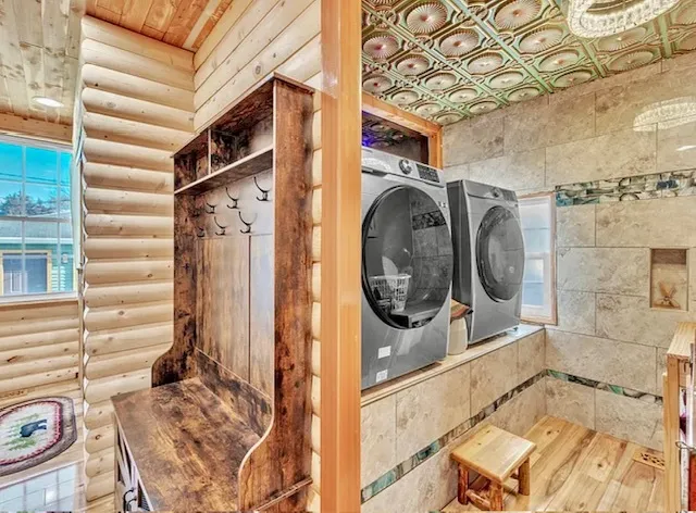 a view of a room with washer and dryer