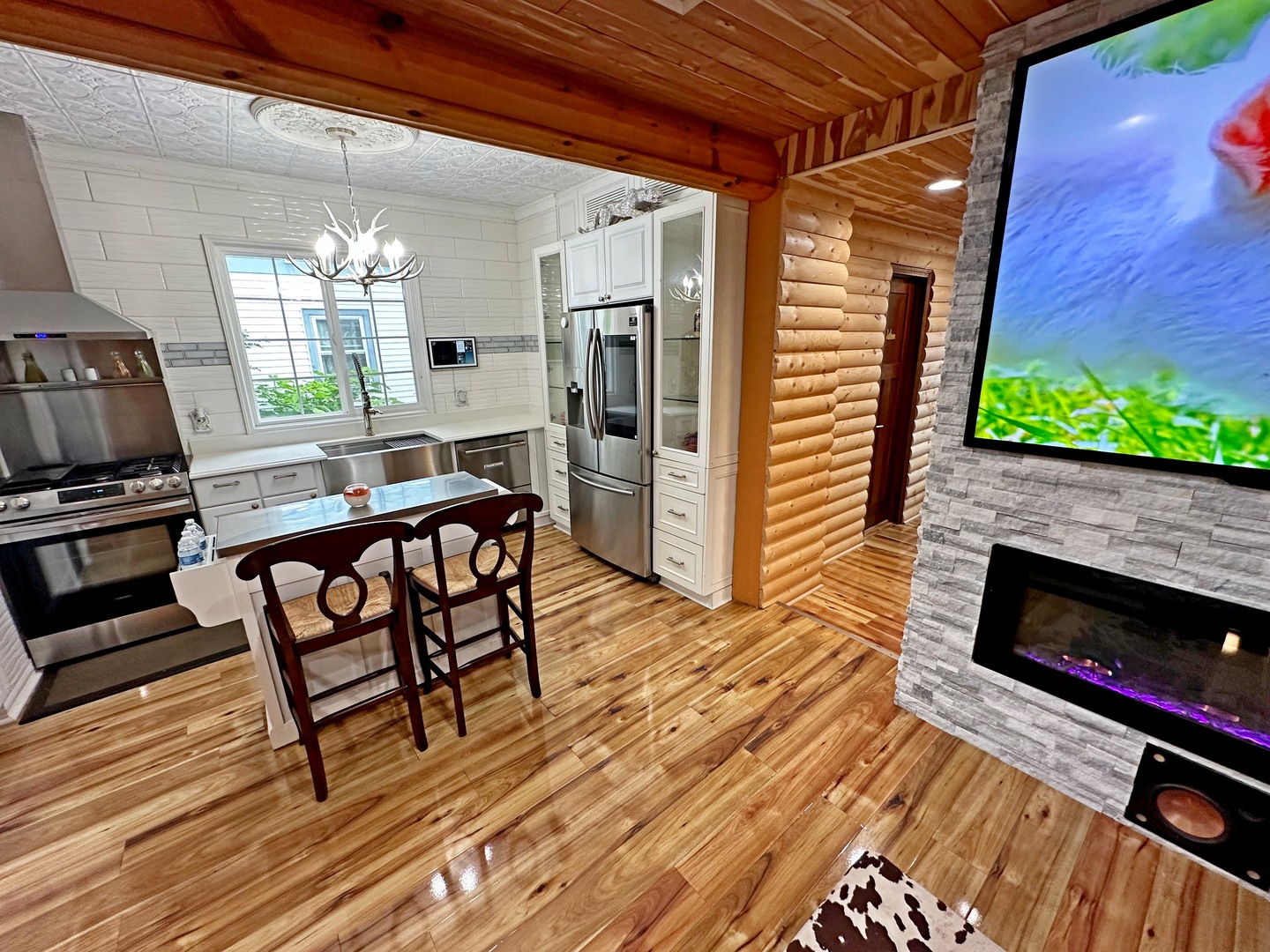 3515 Union Avenue Steger, IL 60475 - Photo 16 of 65 a dining room with furniture a fireplace and wooden floor