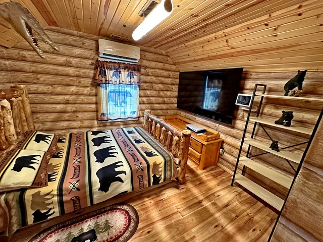 a bathroom with a sink a mirror and a shower