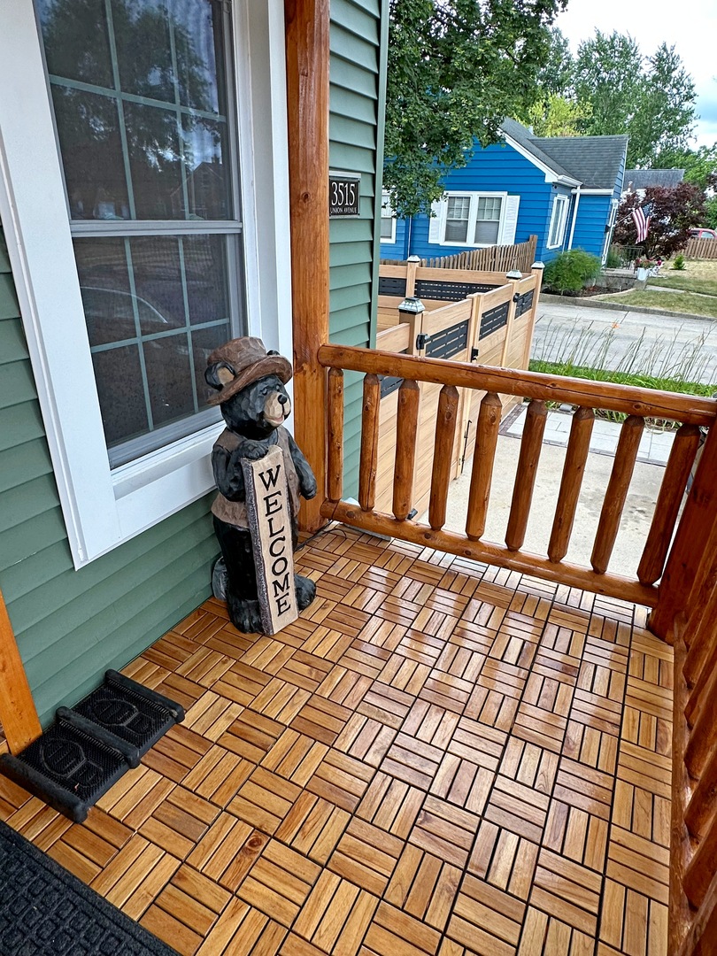 3515 Union Avenue Steger, IL 60475 - Photo 32 of 65 a view of a roof deck with wooden floor and fence
