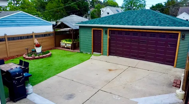 a patio with table and chairs