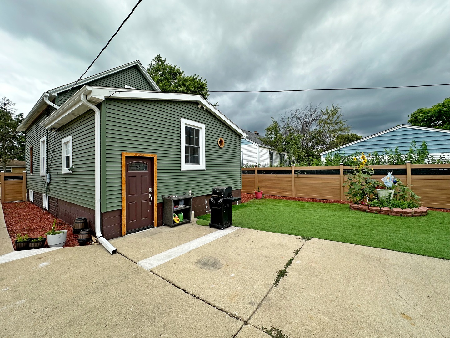 3515 Union Avenue Steger, IL 60475 - Photo 36 of 65 a front view of a house with a yard and garage
