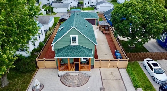 3515 Union Avenue Steger, IL 60475 - Photo 62 of 65 an aerial view of a house with swimming pool garden and patio