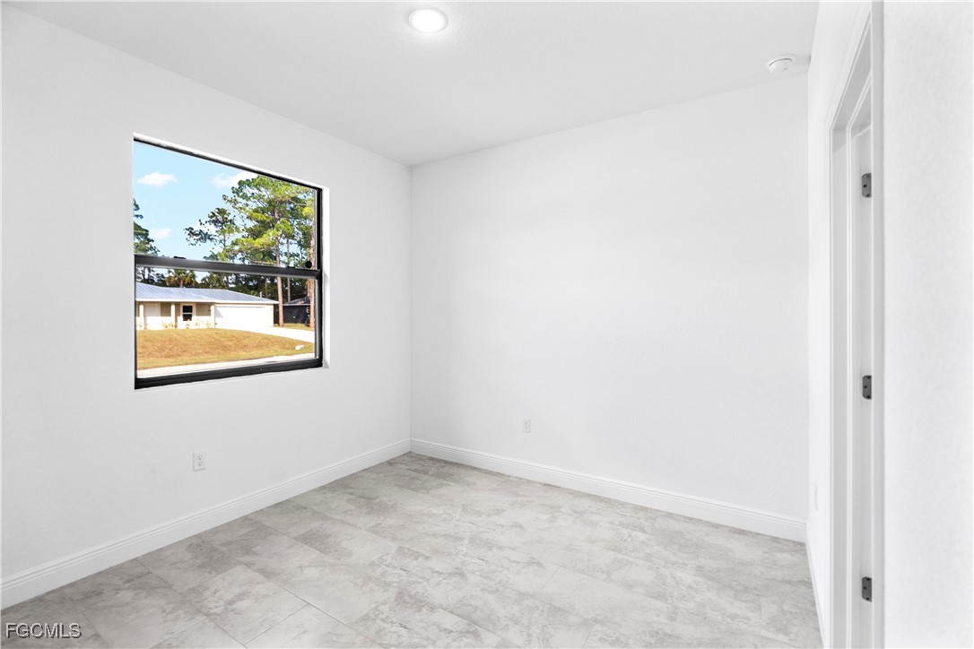 5008 Myrtlewood Road LaBelle, FL 33935 - Photo 20 of 37 a view of an empty room with window