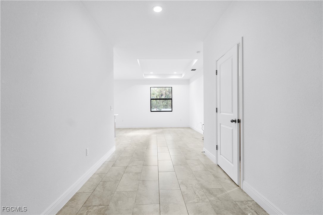 5008 Myrtlewood Road LaBelle, FL 33935 - Photo 26 of 37 a view of a hallway with a window