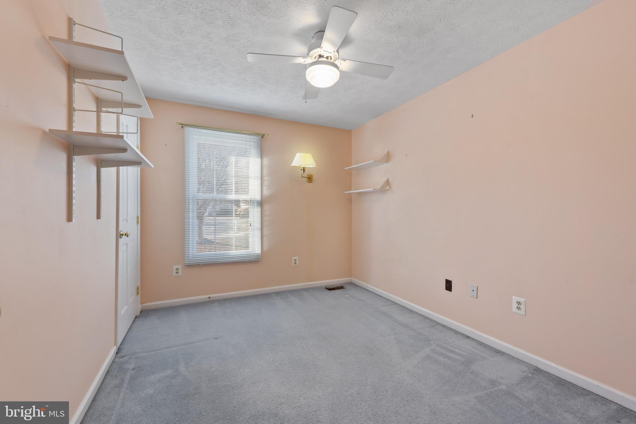 452 Doe Meadow Drive Owings Mills, MD 21117 - Photo 18 of 34 a view of an empty room with a window