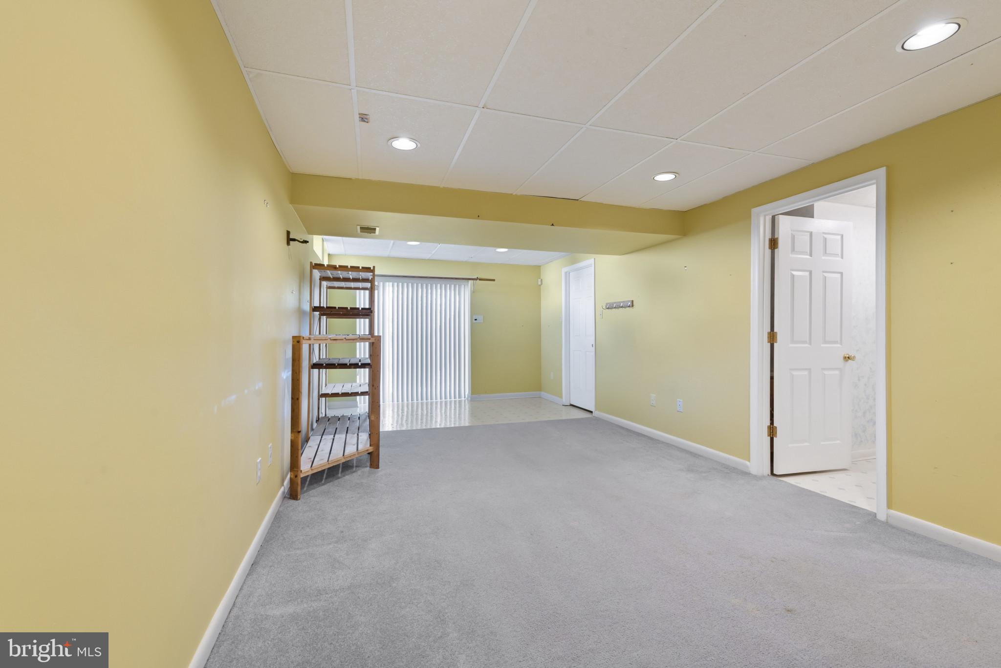 452 Doe Meadow Drive Owings Mills, MD 21117 - Photo 25 of 34 a view of an empty room with a fireplace