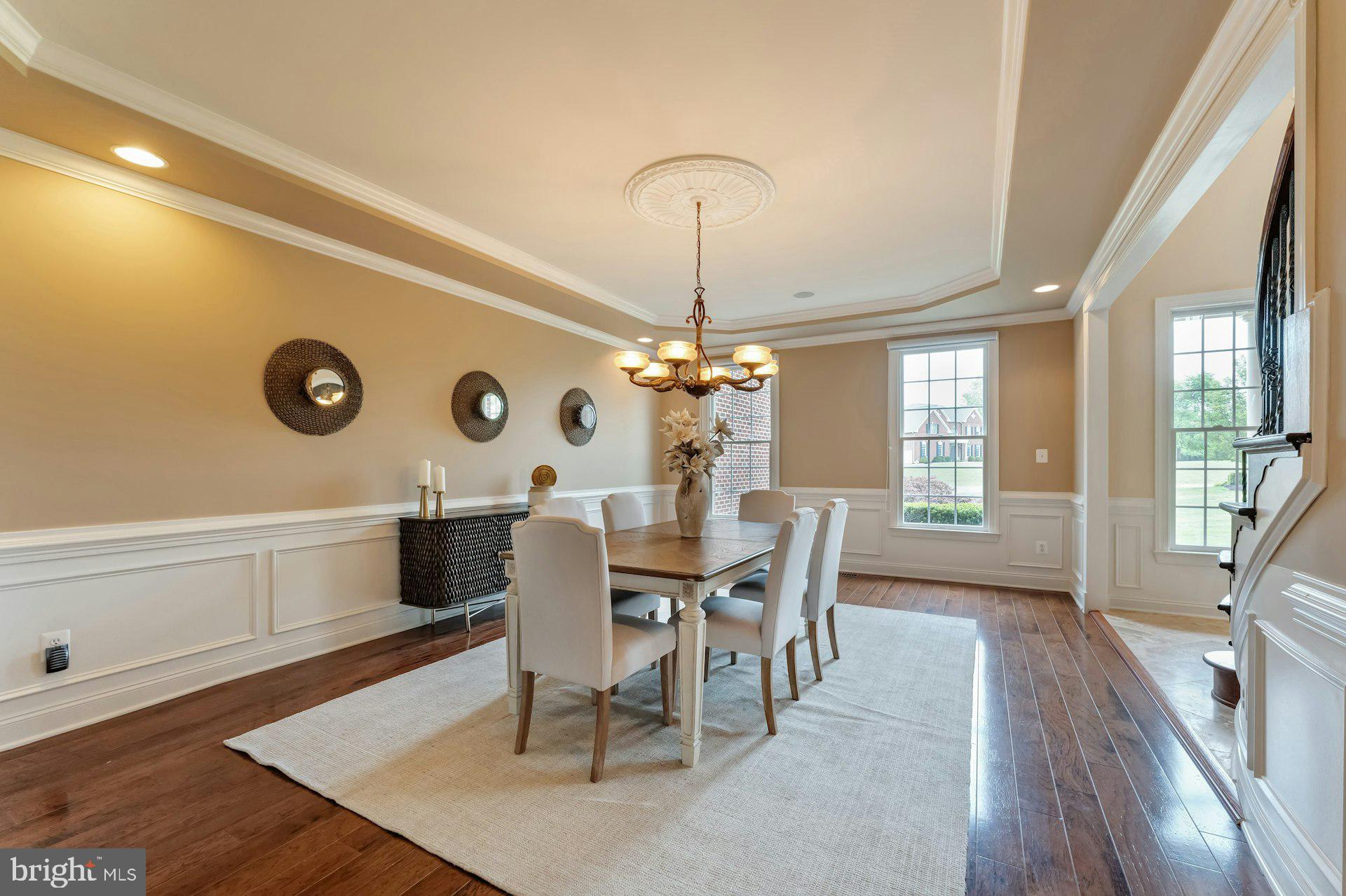 18102 Eaglesham Court Leesburg, VA 20175 - Photo 19 of 92 a view of a dining room with furniture and window