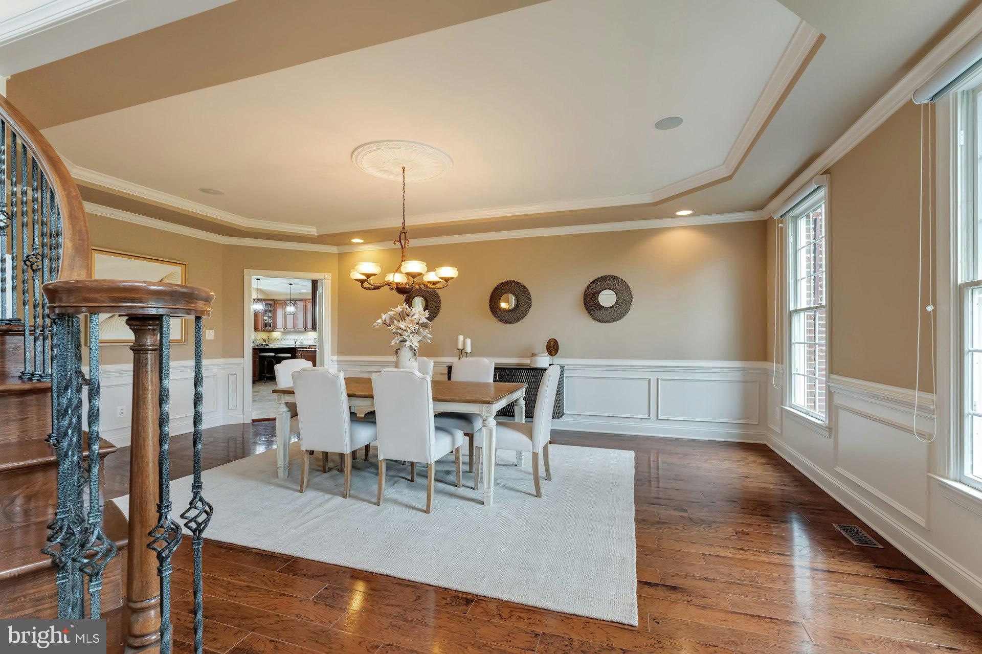 18102 Eaglesham Court Leesburg, VA 20175 - Photo 21 of 92 a view of a dining room with furniture and chandelier
