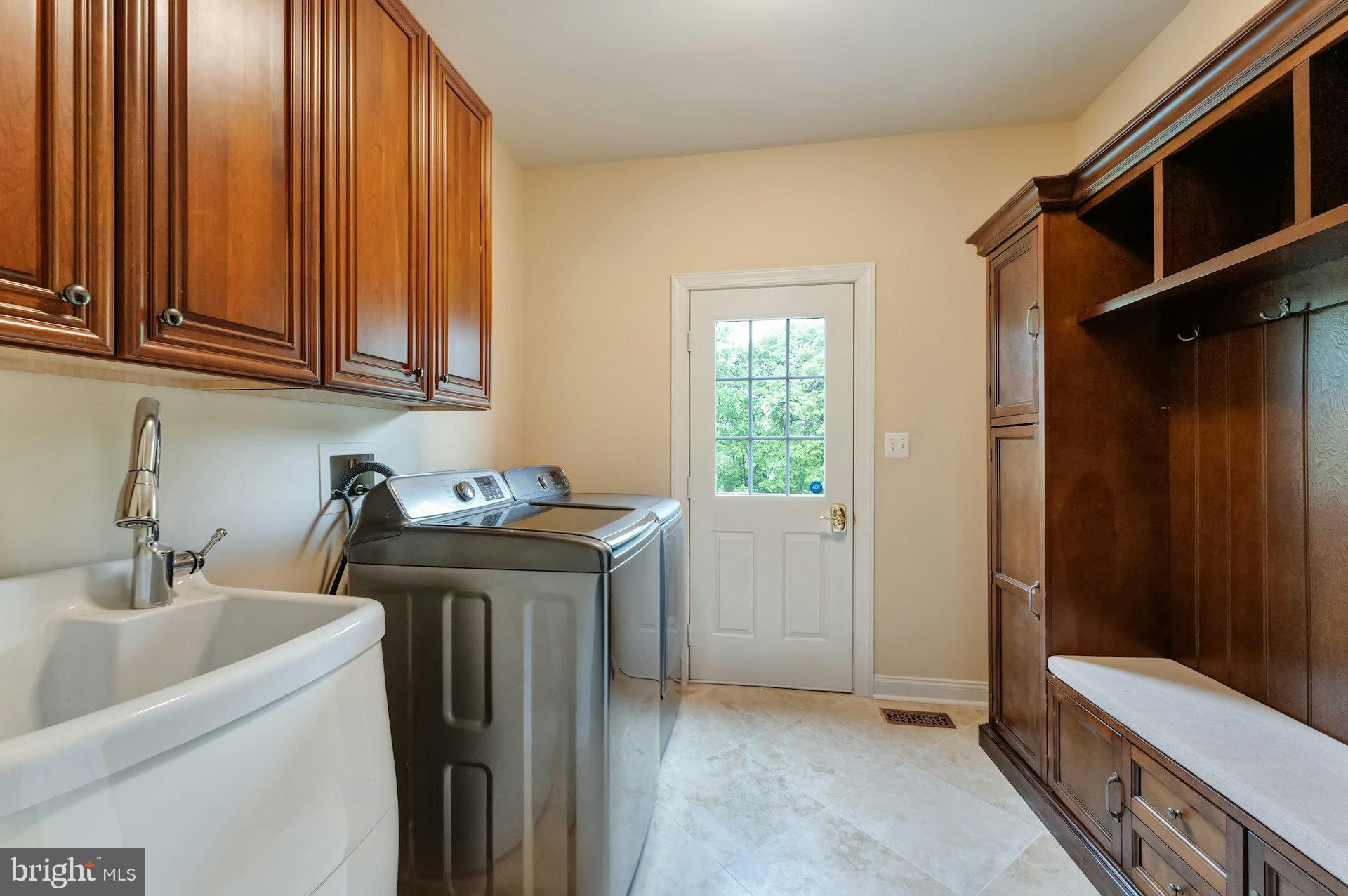 18102 Eaglesham Court Leesburg, VA 20175 - Photo 30 of 92 a utility room with closet dryer and washer
