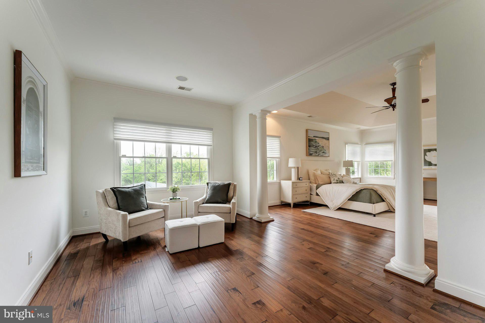 18102 Eaglesham Court Leesburg, VA 20175 - Photo 34 of 92 a living room with furniture and a large window