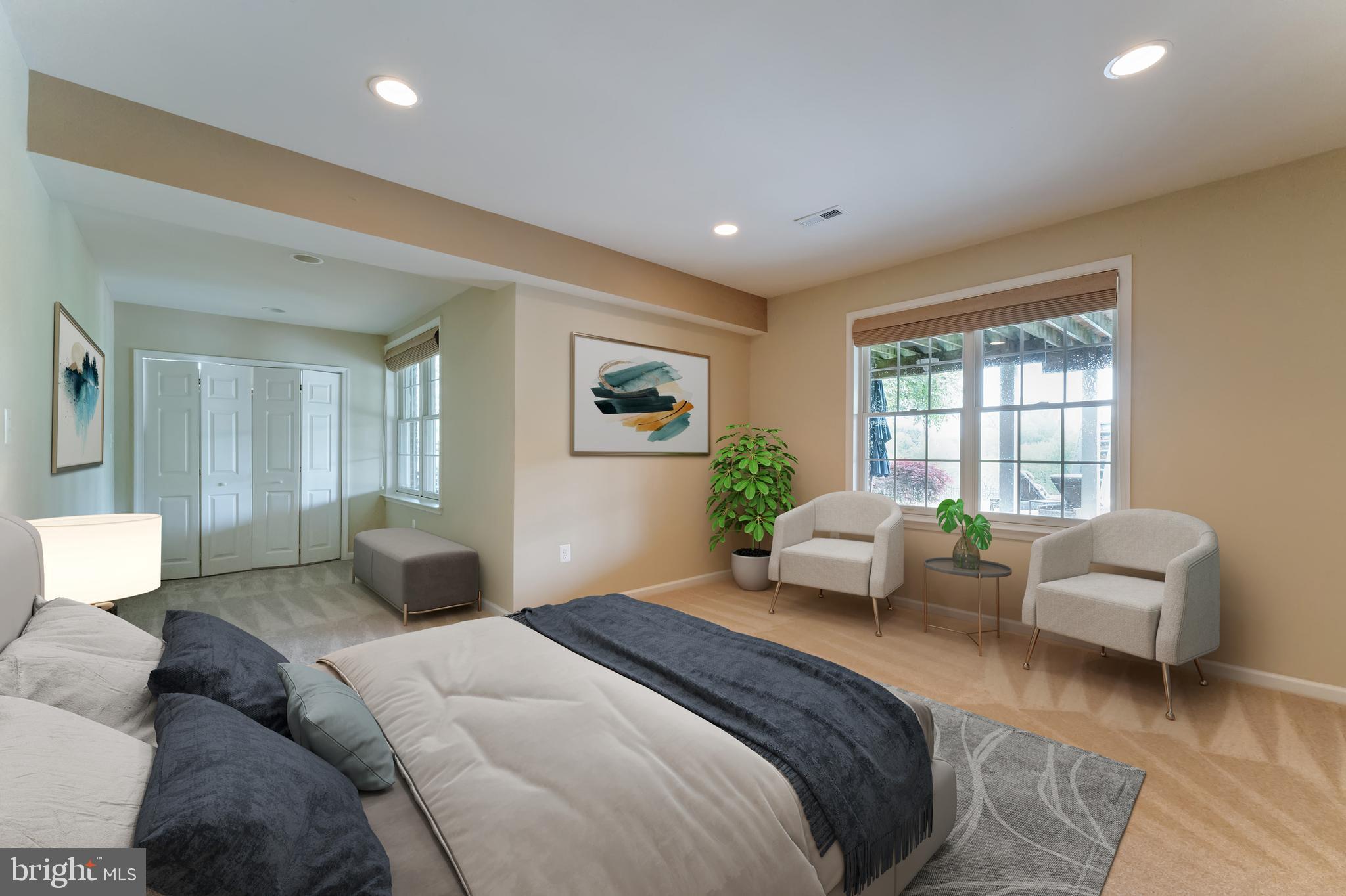 18102 Eaglesham Court Leesburg, VA 20175 - Photo 62 of 92 a bedroom with a balcony a bed couch and a window