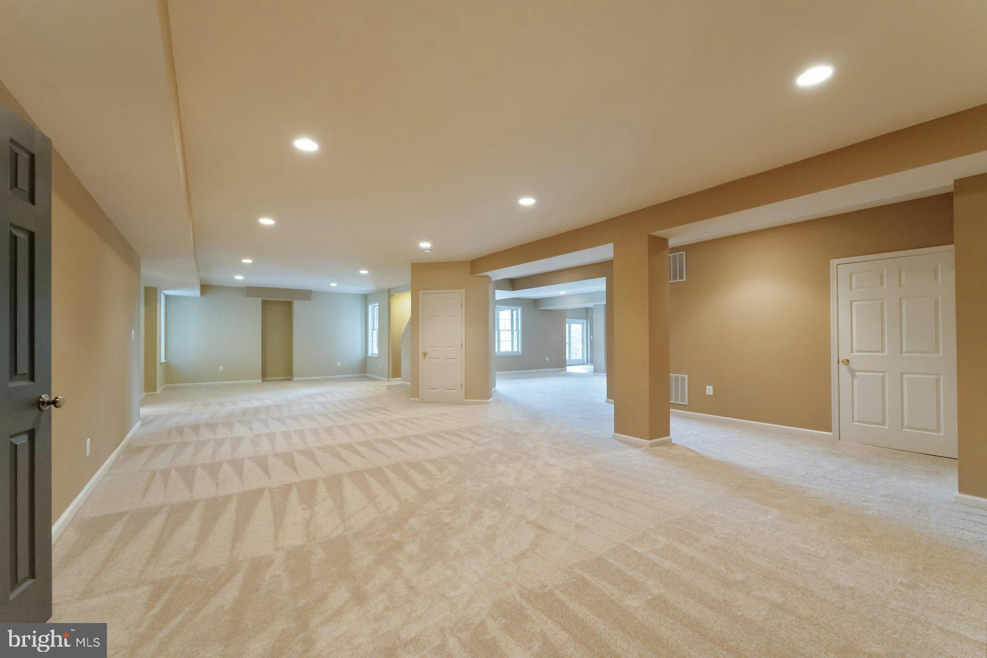 18102 Eaglesham Court Leesburg, VA 20175 - Photo 66 of 92 a view of an empty room with wooden floor