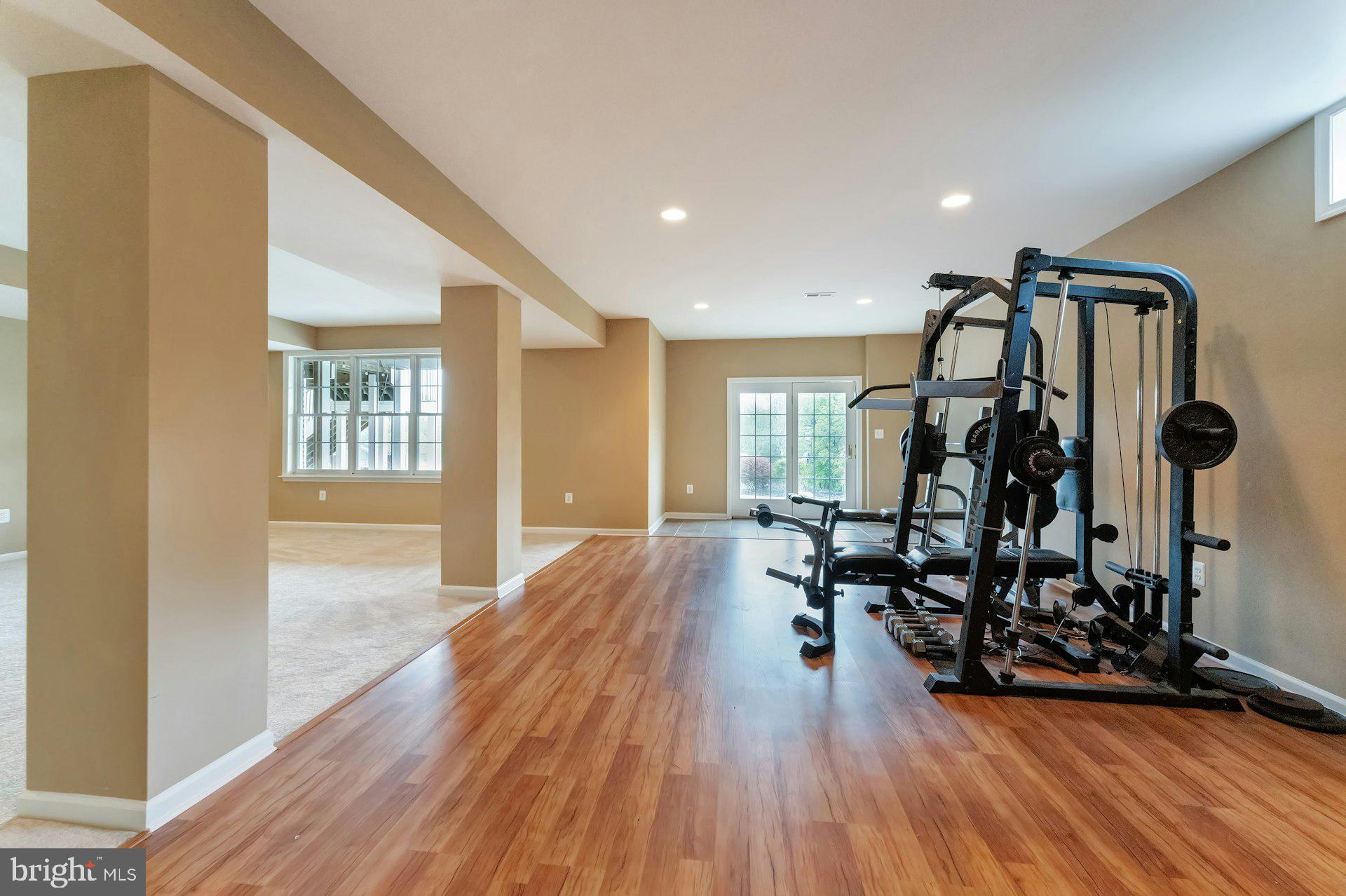 18102 Eaglesham Court Leesburg, VA 20175 - Photo 69 of 92 a view of a room with gym equipment