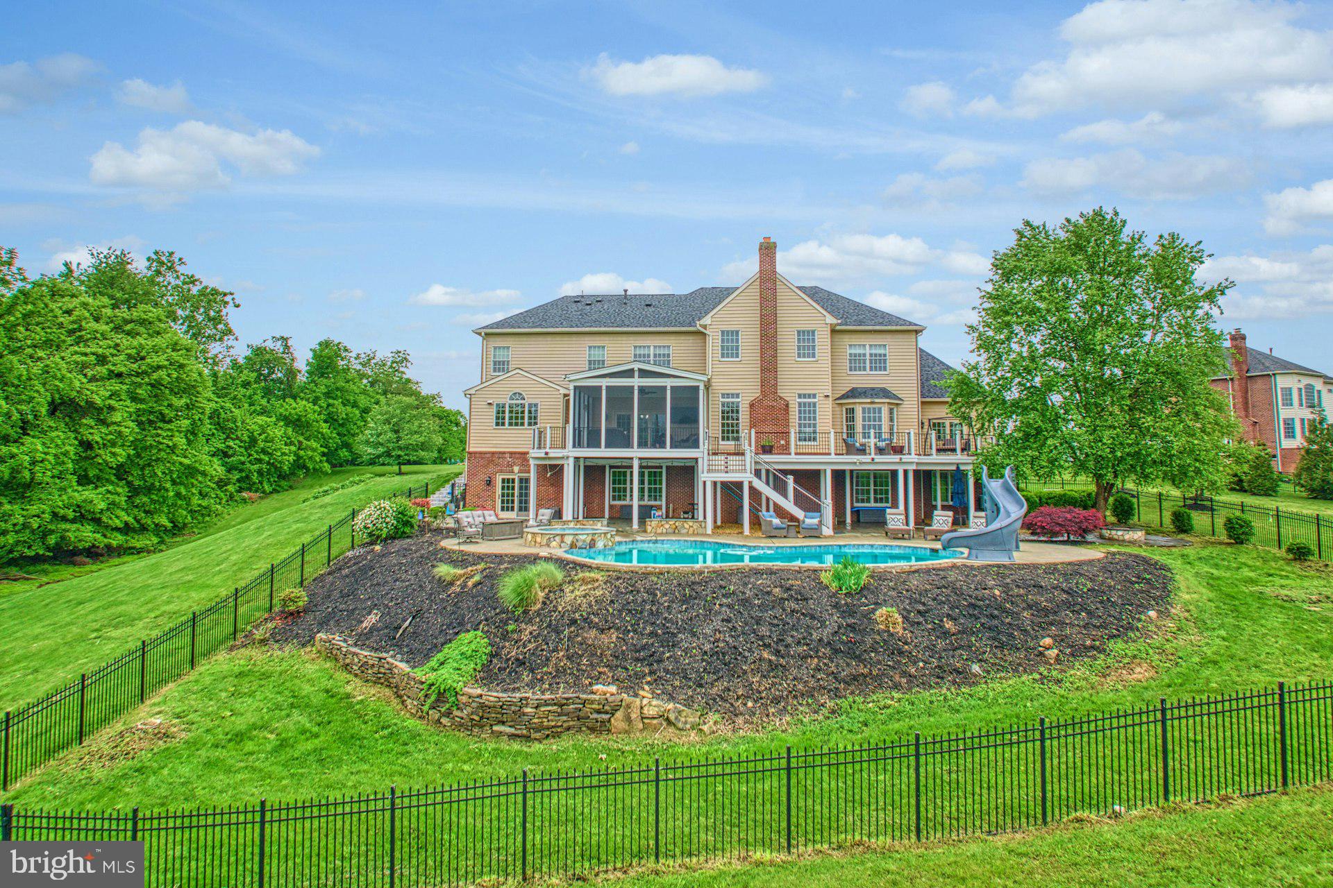 18102 Eaglesham Court Leesburg, VA 20175 - Photo 79 of 92 a front view of a house with a yard