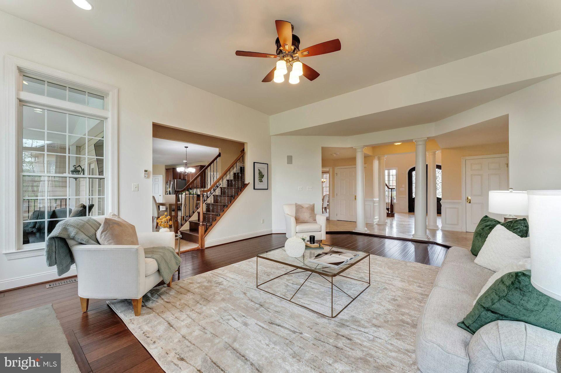 18102 Eaglesham Court Leesburg, VA 20175 - Photo 8 of 92 a living room with furniture and a large window