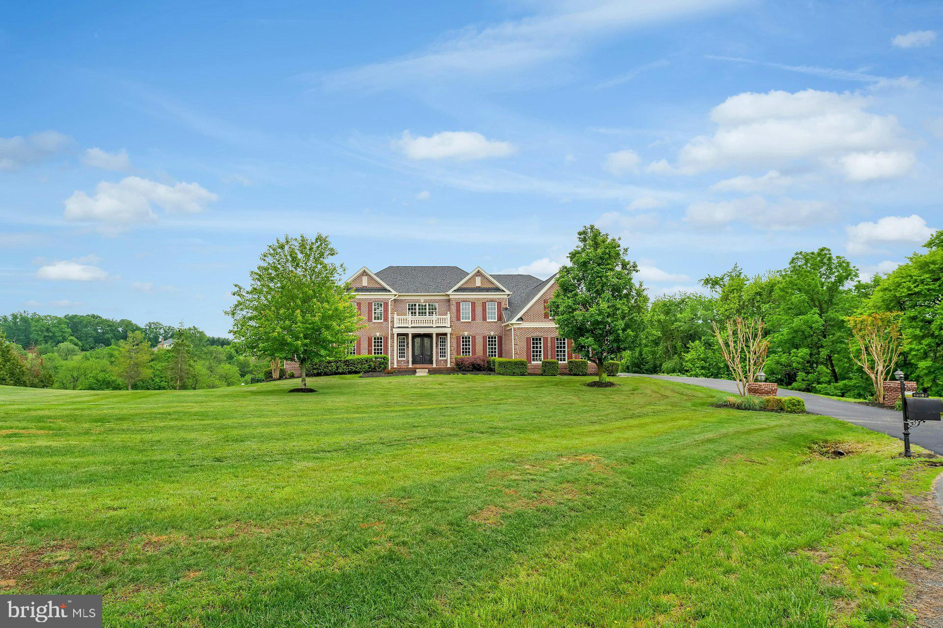 18102 Eaglesham Court Leesburg, VA 20175 - Photo 86 of 92 a view of a big yard with a house in the background