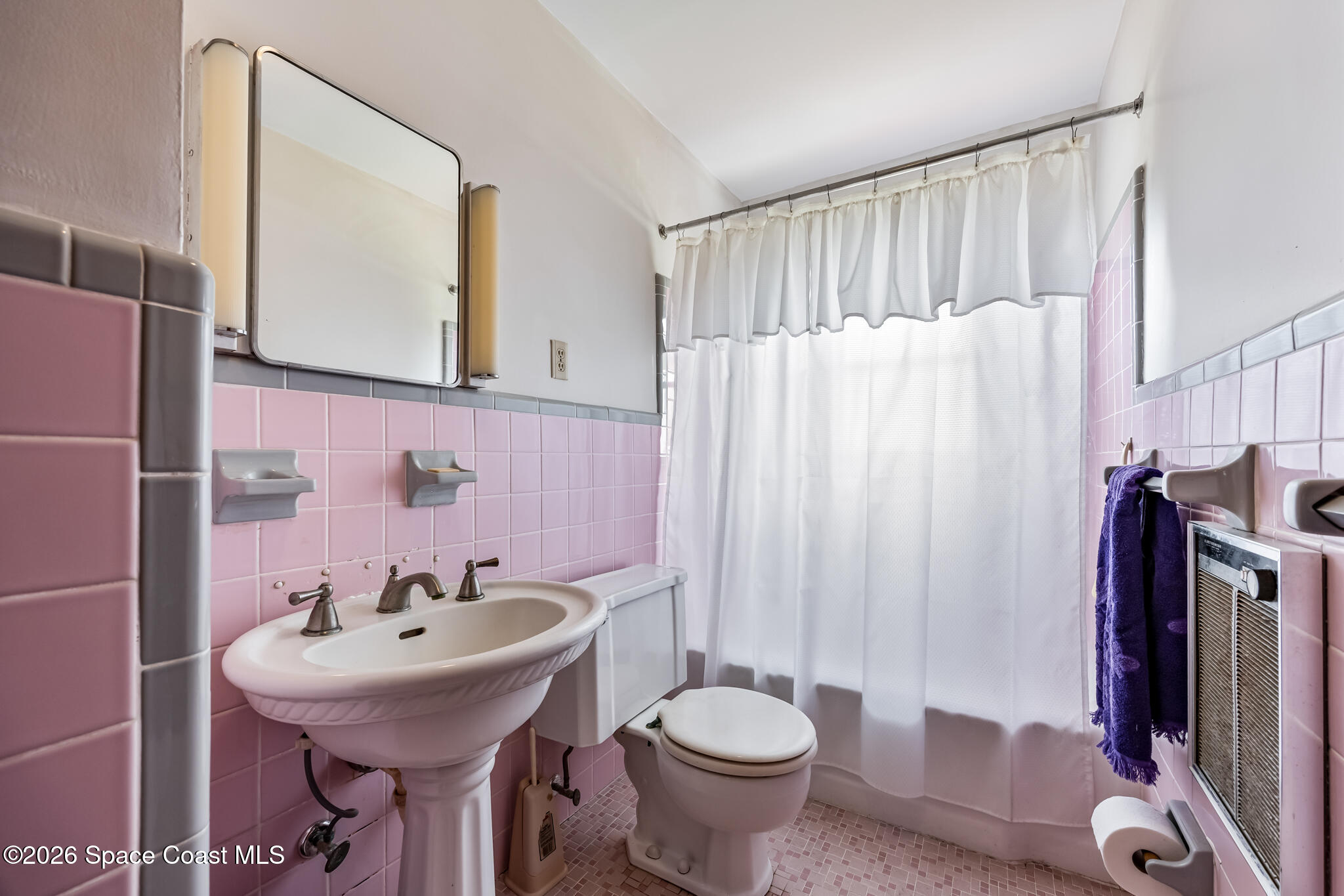 2030 City Acres Road Melbourne, FL 32904 - Photo 15 of 31 a bathroom with a sink toilet and shower