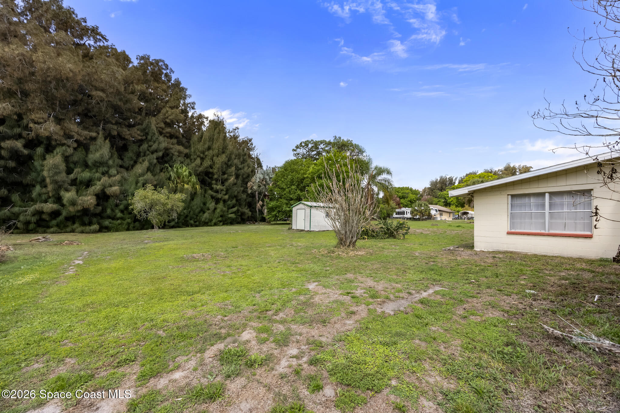 2030 City Acres Road Melbourne, FL 32904 - Photo 24 of 31 a view of a backyard