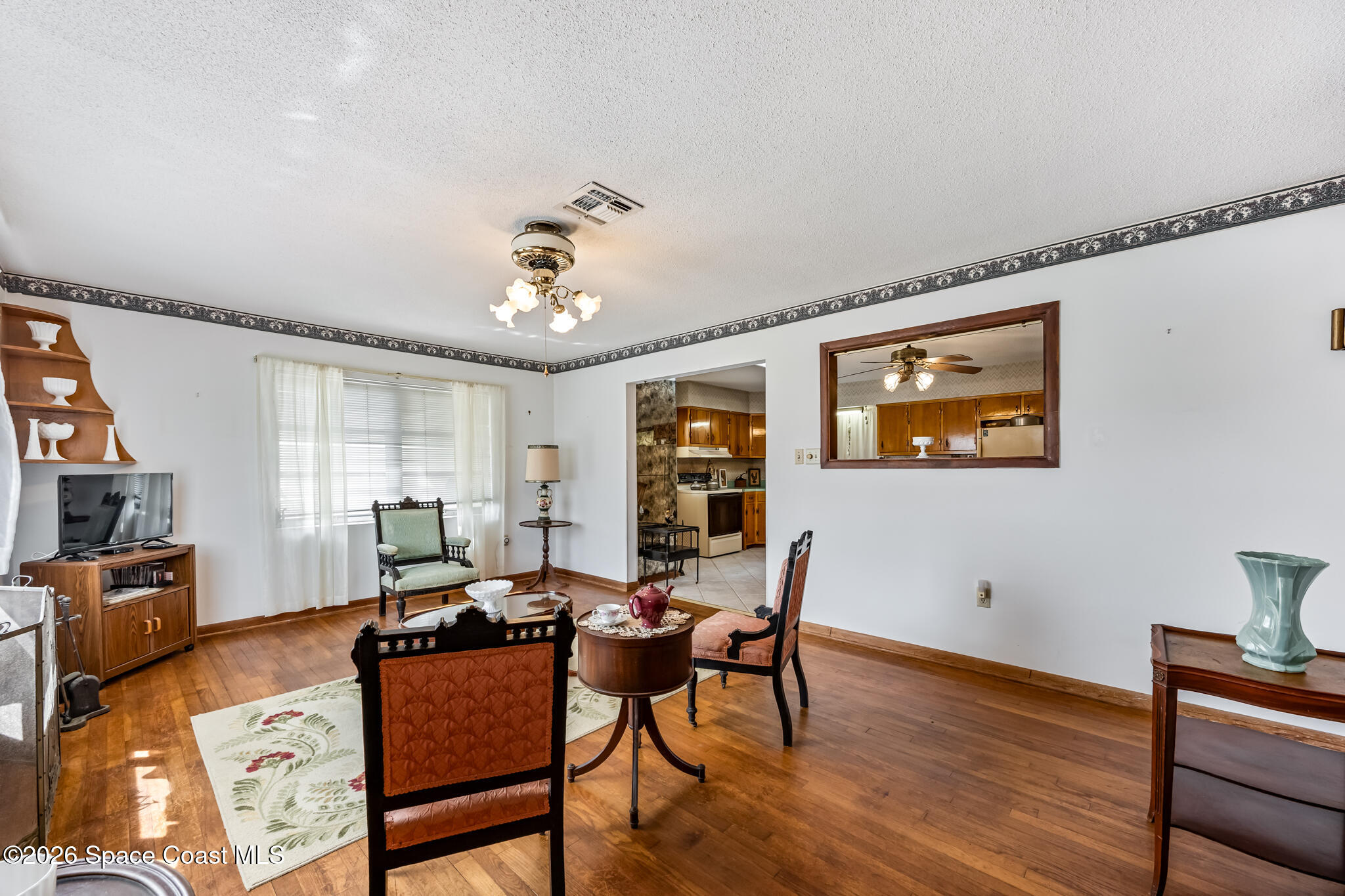 2030 City Acres Road Melbourne, FL 32904 - Photo 3 of 31 a view of a dining room with furniture