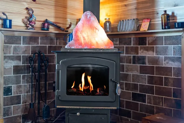 a room with a fireplace and a closet
