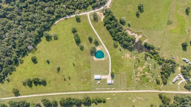 a lake view with houses in the background