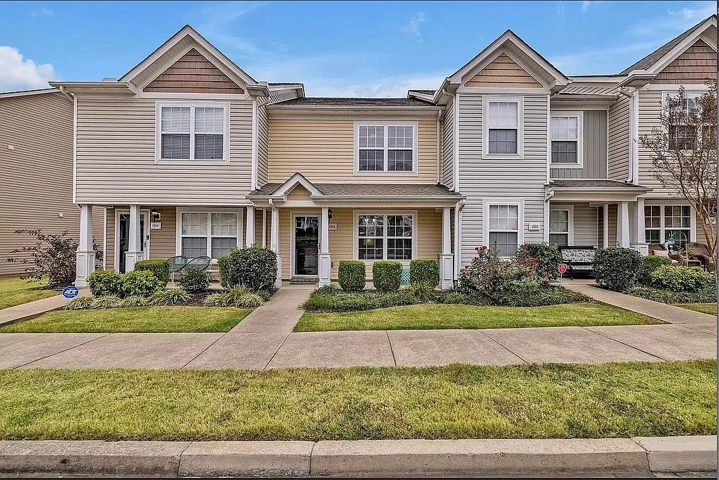 1504 Sprucedale Drive Antioch, TN 37013 - Photo 1 of 30 a front view of a house with a yard