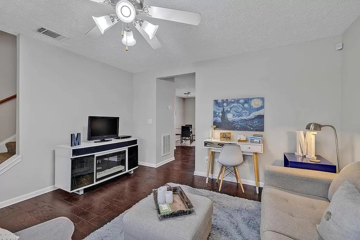 1504 Sprucedale Drive Antioch, TN 37013 - Photo 11 of 30 a living room with furniture and a flat screen tv